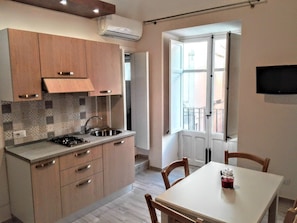 Apartment | Private kitchen | Full-sized fridge, stovetop, cookware/dishes/utensils - Casa White by Wonderful Italy (Cefalù)