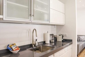 Fridge, microwave, stovetop, coffee/tea maker