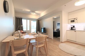 Standard Apartment | Living area | 32-inch TV with cable channels - Forenom Serviced Apts Espoo Matinkylä (Espoo)