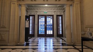 A grand lobby with a marble floor, large columns, and double doors leading to another area. - Hestia at Gral. Las Heras 1700 (Buenos Aires)
