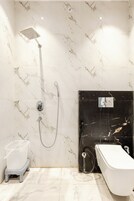 Deluxe Double Room, City View | Bathroom | Shower, rainfall showerhead, towels, soap