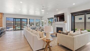 TV, fireplace, books, offices