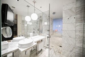 Shower, jetted bath, hair dryer, towels - SVS: Artisan Studio | Remodeled with Original Artwork | Palms Place (Las Vegas)