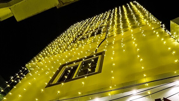 A building with a sign reading "VIA GANGA INN" and string lights. - VIA GANGA INN Varanasi (Varanasi)