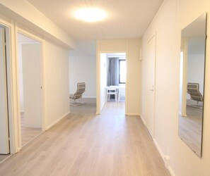 Standard Apartment | Living area | 32-inch TV with cable channels