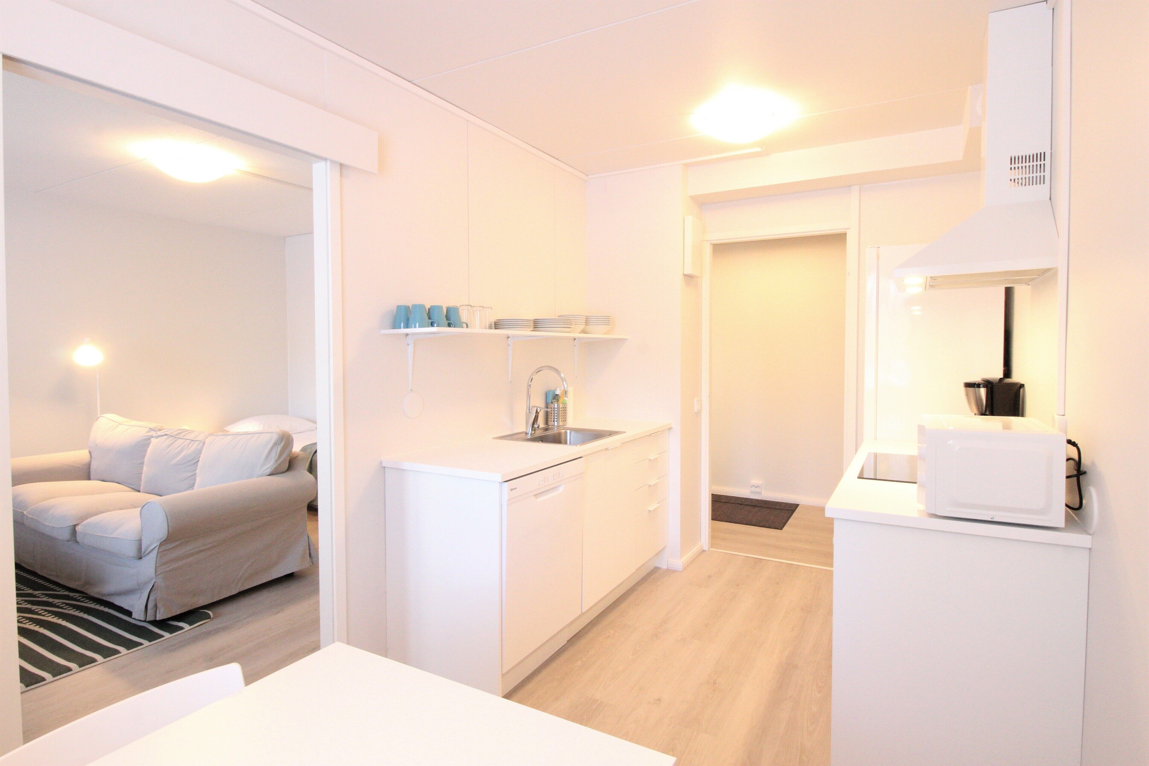 Standard Apartment | Living area | 32-inch TV with cable channels