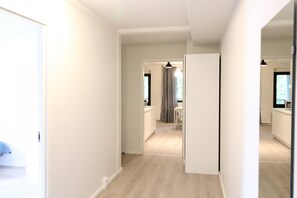 Standard Apartment | Living area | 32-inch TV with cable channels