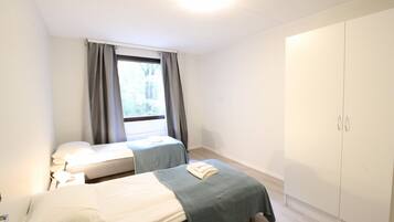 Standard Apartment | 3 bedrooms, blackout drapes, iron/ironing board, free WiFi