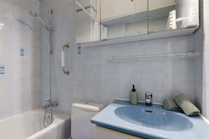 Shower, hair dryer, towels, shampoo