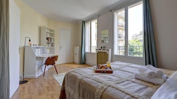 1 bedroom, desk, iron/ironing board, travel crib