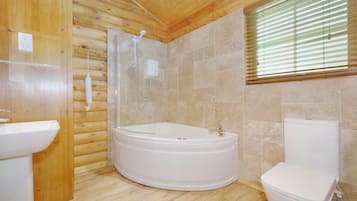 Jetted bath, hair dryer, towels