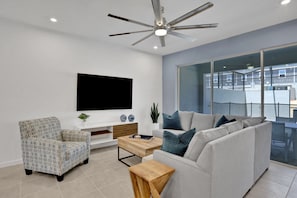 Townhome, 5 Bedrooms | Living area - 2382zbp- Solara Resort 5 Bedroom Townhouse by RedAwning (Kissimmee)