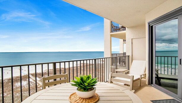 A balcony with a view of the beach and ocean. - Beachfront, Updated!  1BR (Orange Beach)