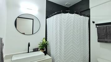 Hair dryer, towels, soap, shampoo