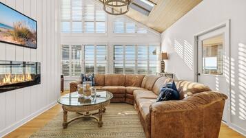 TV connectée, cheminée, table de tennis de table