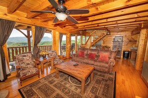 TV, fireplace, table football - *Romantic 2BD Cabin w/ Hot Tub! Foosball + VIEWS!* (Sevierville)