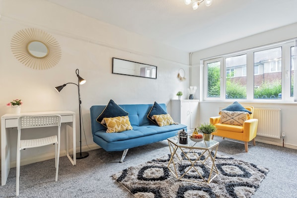 Appartement | Aire de séjour | Téléviseur, foyer
