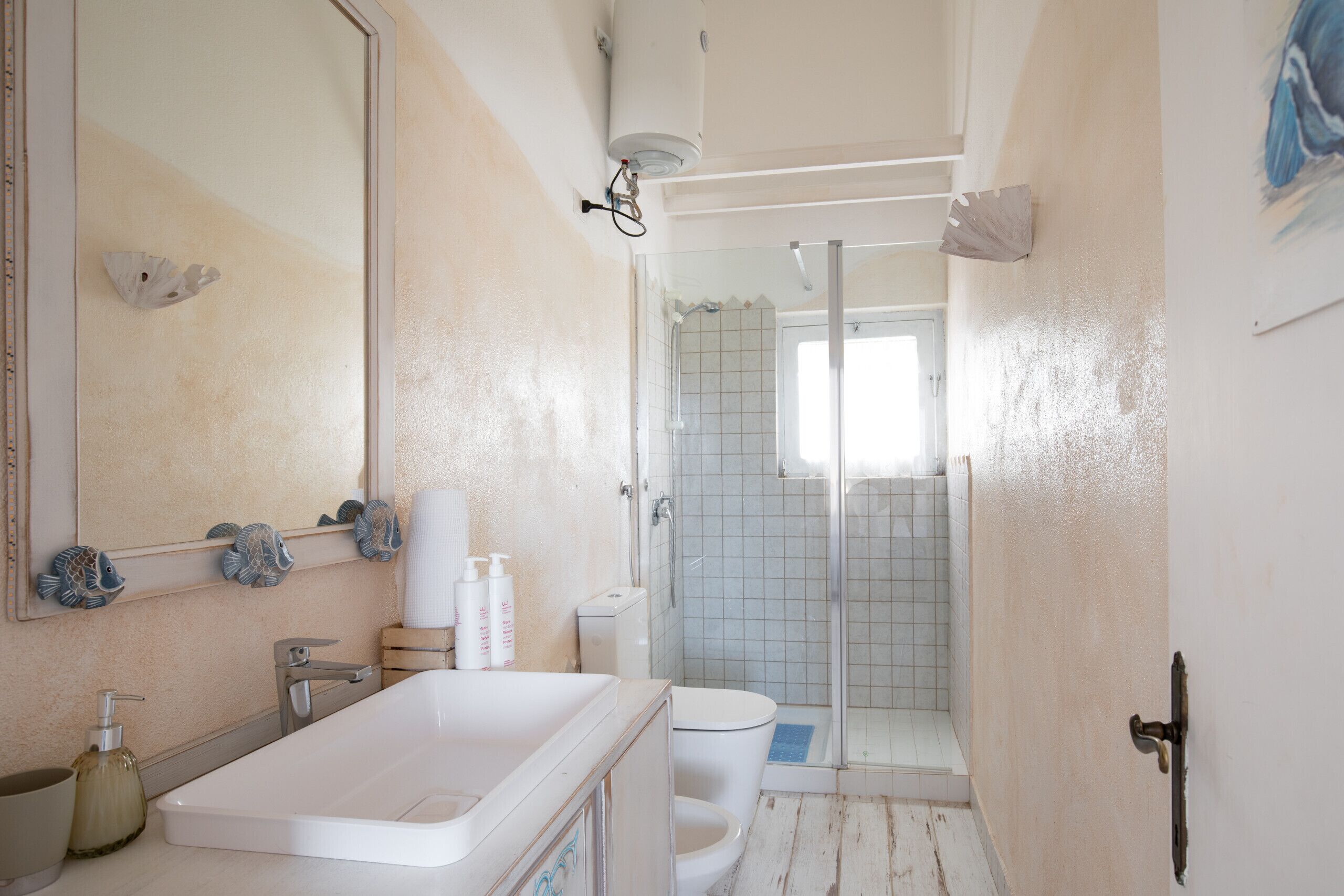 Shower, bidet, towels, soap
