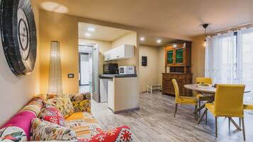 Apartment, Balcony | Living area | 35-inch TV with digital channels