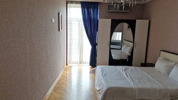 2 habitaciones, tabla de planchar con plancha, wifi y ropa de cama