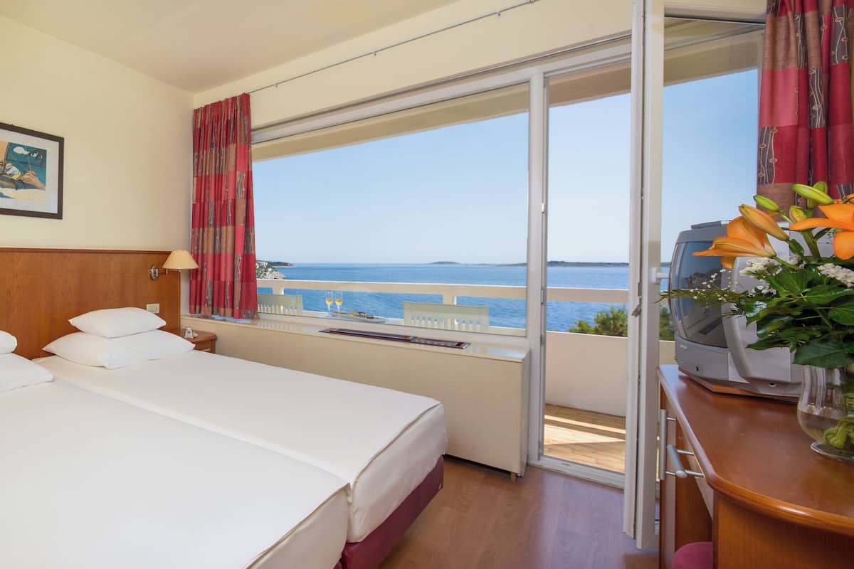 Family Room, Balcony, Sea View | Free WiFi, bed sheets