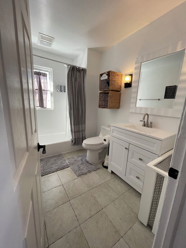 Hair dryer, towels, soap, shampoo