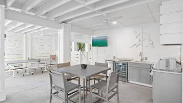 A modern kitchen with a built-in oven, a sink, and a countertop.