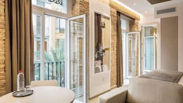 Standard Loft, 1 Queen Bed, Balcony, City View | In-room safe, blackout drapes, WiFi (free), bed sheets