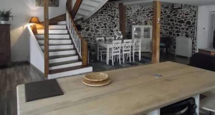 Large house at the foot of the mountains