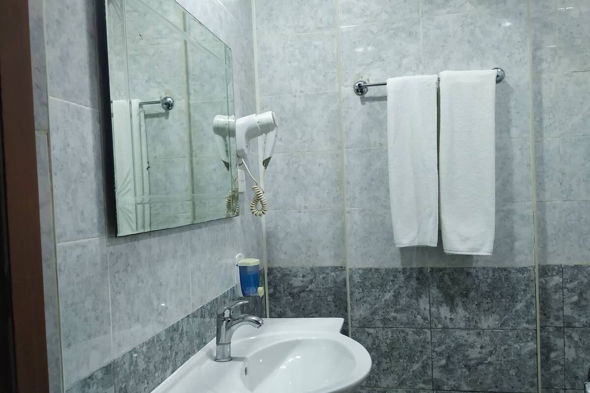Shower, free toiletries, hair dryer, bathrobes