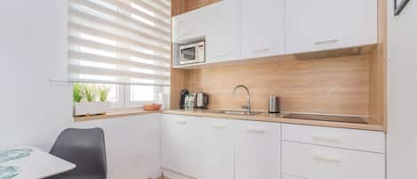 Comfort Apartment, City View | Private kitchen | Electric kettle