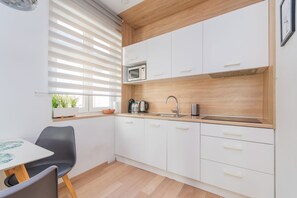 Comfort Apartment, City View | Private kitchen