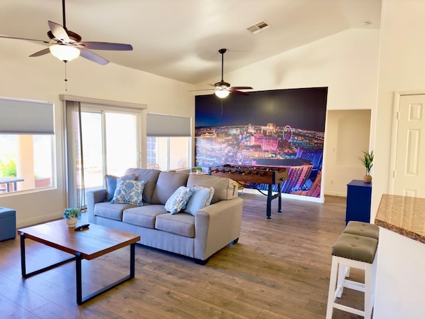 Smart TV, fireplace, foosball, books