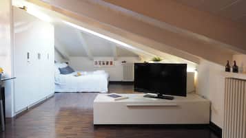 Apartment | Living area | 35-inch flat-screen TV with digital channels