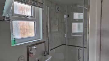 Shower, free toiletries, hair dryer, towels