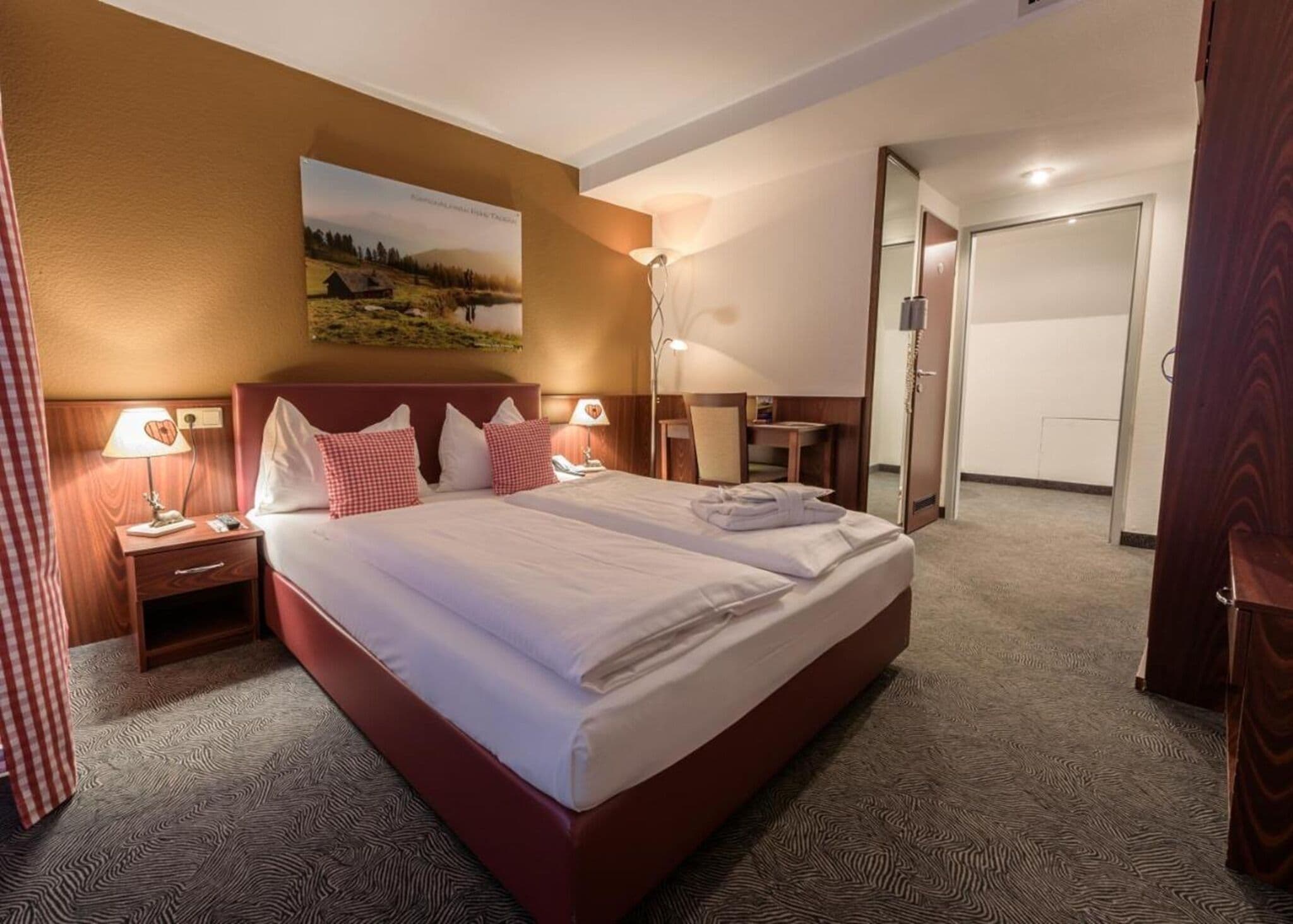 Hypo-allergenic bedding available, in-room safe, desk, laptop workspace
