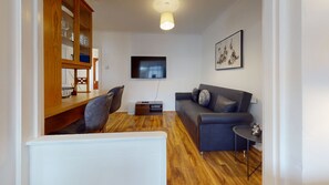 Ferienhaus | Wohnbereich | Fernseher