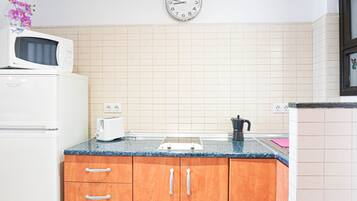 Fridge, microwave, coffee/tea maker, electric kettle