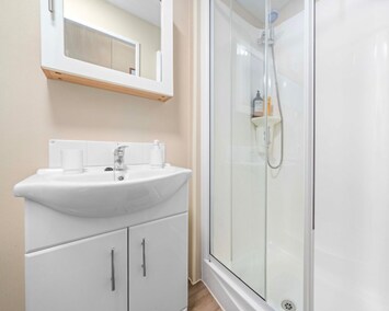 Relax and unwind in this clean, modern bathroom – your private oasis during your stay.