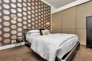 1 غرفة نوم ومكواة/لوح كي وواي فاي وملاءات أسرّة