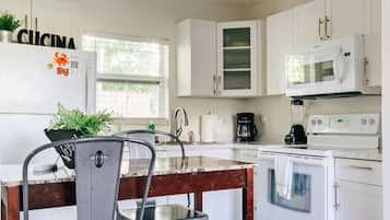 Coffee/tea maker, fridge, microwave, oven