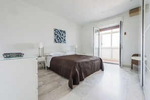 Apartment, Sea View | 2 bedrooms, laptop workspace, iron/ironing board, cribs/infant beds