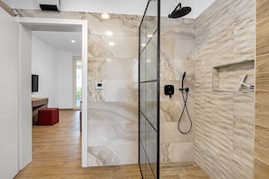 Shower, hair dryer, towels