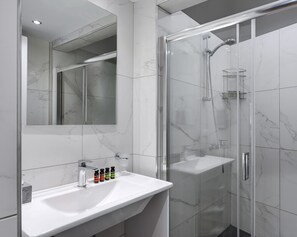 Shower, towels, soap, shampoo