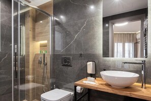 Shower, towels, soap, shampoo