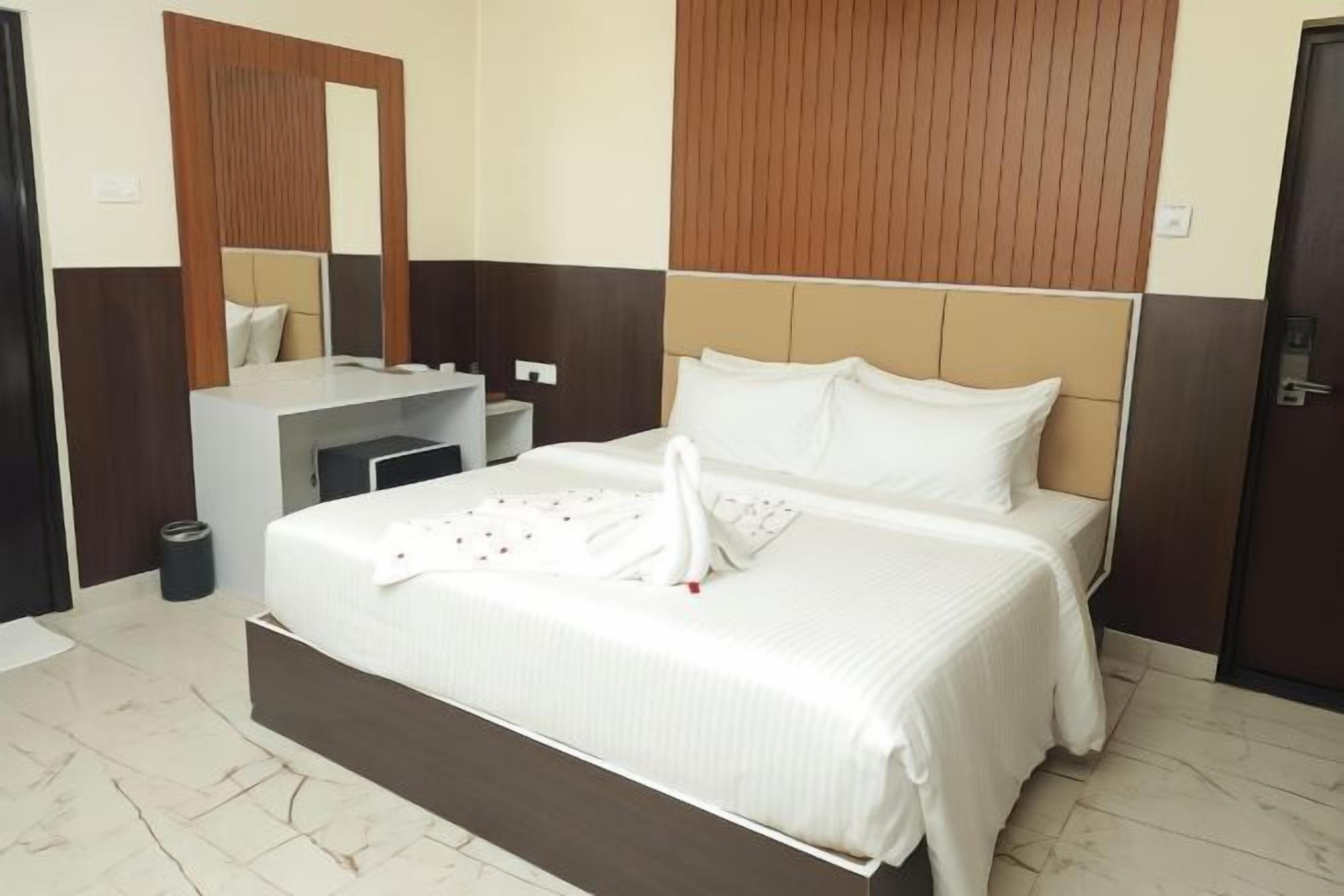 Lydisolert, strykejern/-brett og wi-fi (inkludert)