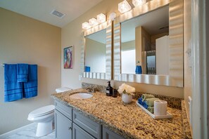 Shower, jetted bath, hair dryer, towels