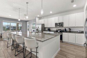 Fridge, microwave, oven, stovetop - NEW! Resort 14BR 11BA Vacation Pool Villa - Disney, Home Theater, Game Room (Davenport)