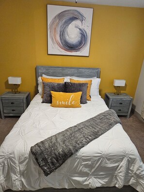 1 bedroom, desk, iron/ironing board, travel crib