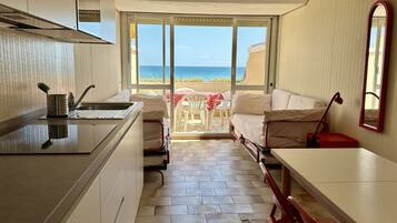 Fridge, oven, dishwasher, dining tables